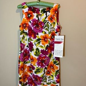 Selling a brand new sleeveless floral dress.